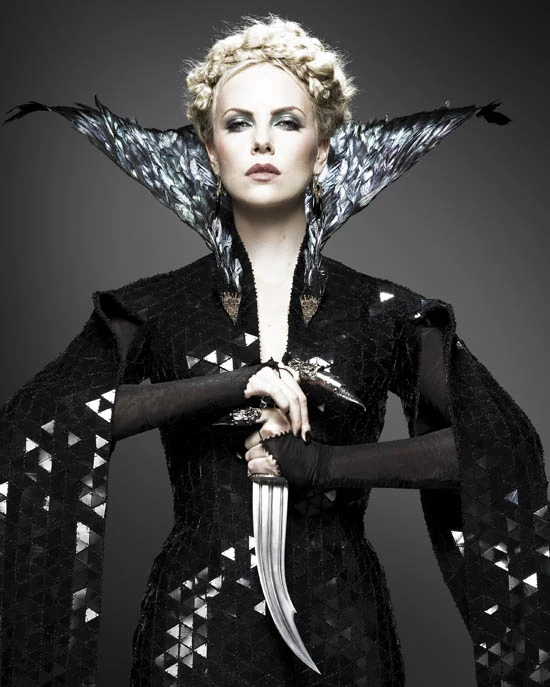 Snow White and the Huntsman movie poster featuring a fierce evil queen